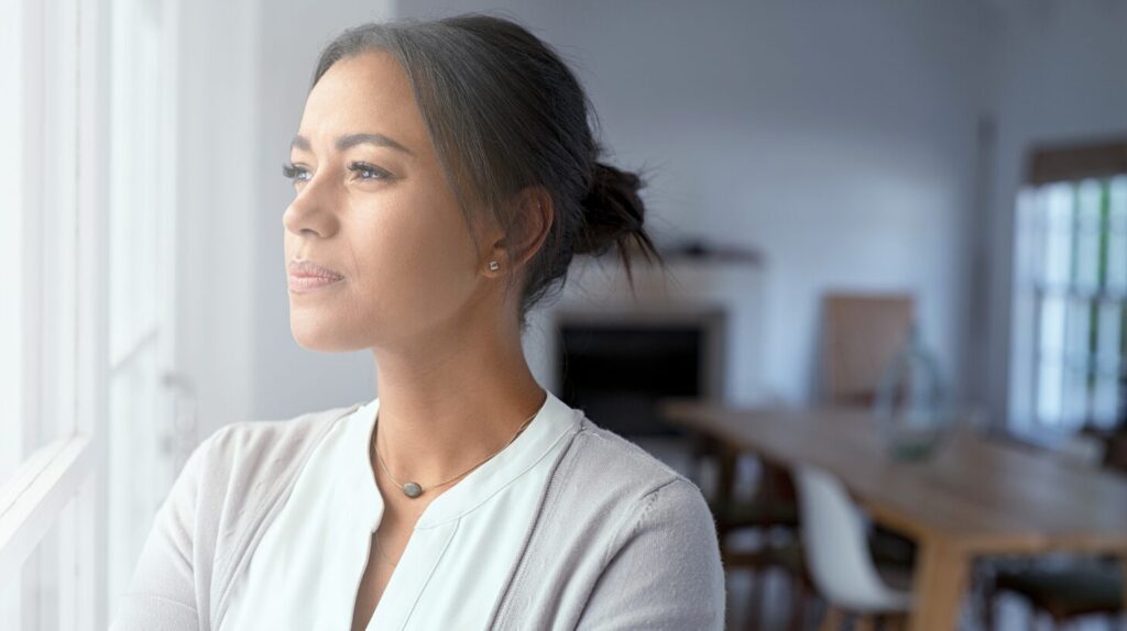 Woman noticing early pregnancy symptoms and considering when to take a pregnancy test at Advanced Women’s Care in the Phoenix Valley